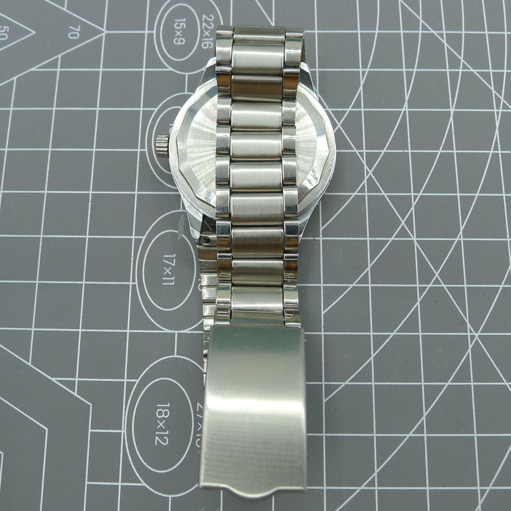 Shanghai Factory 36.5mm manual mechanical watch with 19 jewels, shock-resistant for lasting precision and style.