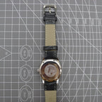 Beijing 31mm manual mechanical watch with silver case and double rhomb dial, showcasing classic Chinese craftsmanship and elegant design.