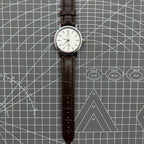 China Baihua 37mm manual mechanical watch with silver dial, 19 jewels, shock-resistant for daily wear.