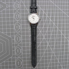Silver 31mm Beijing Double Rhomb manual watch with three hands, elegant design for classic style.