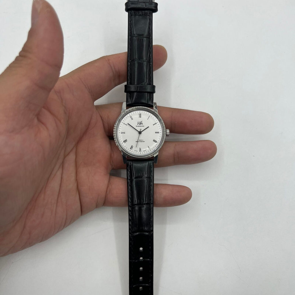 Vintage 36mm Shanghai Factory 8120 manual mechanical watch with shock-resistant 17 jewels, classic design.