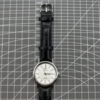 China Baihua 37mm manual mechanical watch with silver dial, 19 jewels, shock-resistant design for durability.
