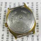 Black Dandong manual mechanical watch with 17 jewels, golden dial, and single calendar for timeless style.