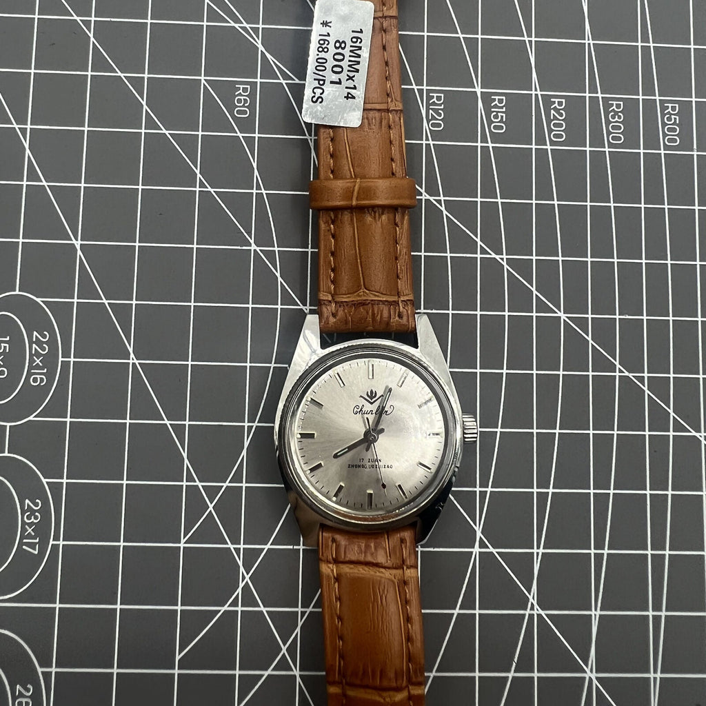 Chunlan 32mm manual watch with silver dial and precise 17 jewel mechanical movement.