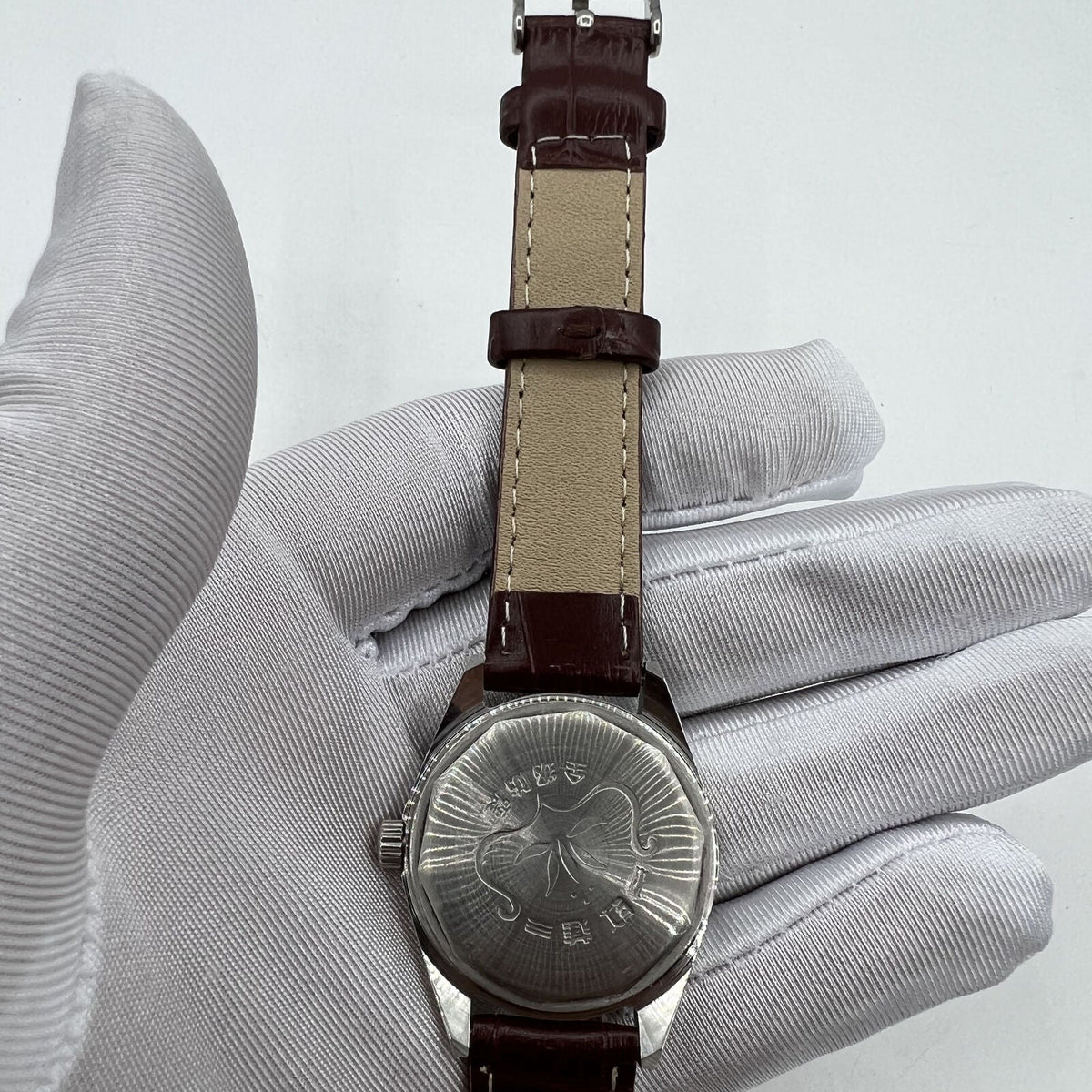 HONGLIAN 32mm manual mechanical watch with 17 jewels, Roman numeral dial, elegant classic design.