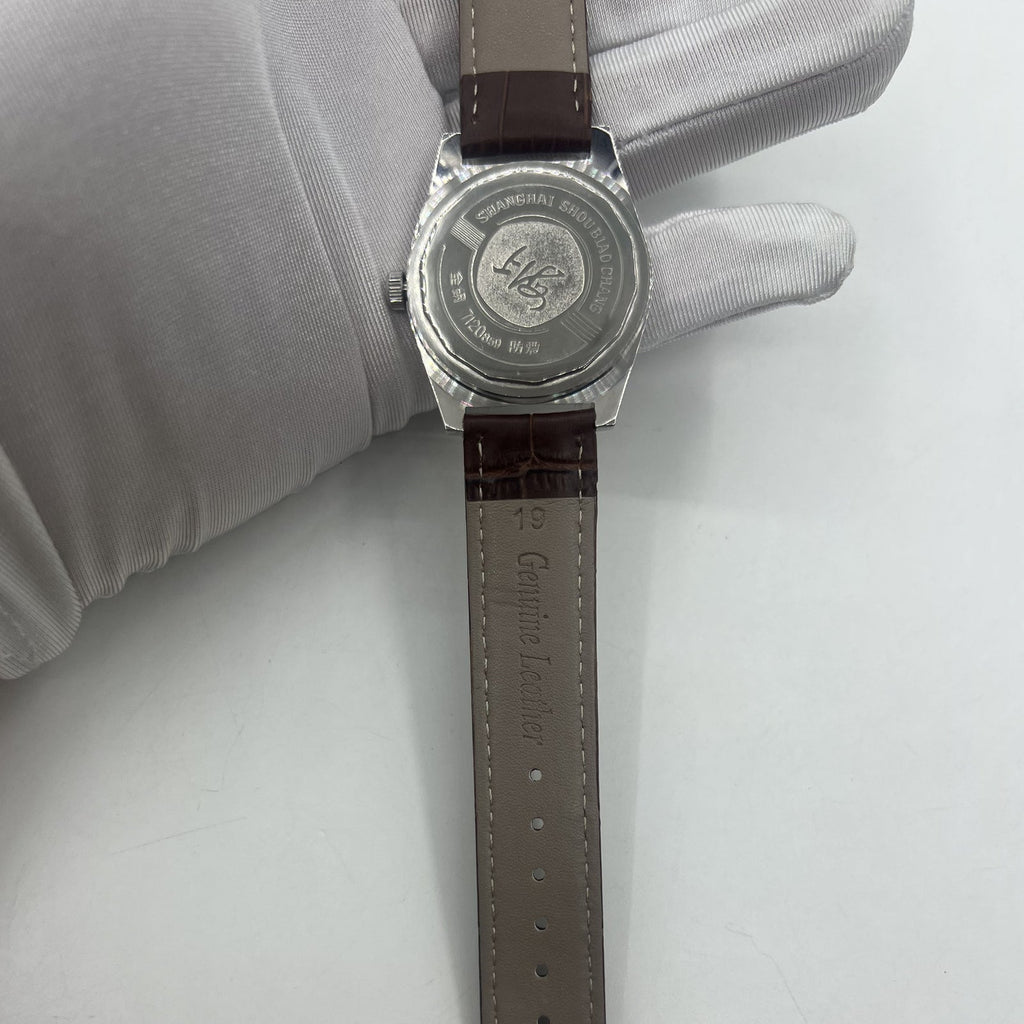Shanghai Factory 38mm manual mechanical watch with white dial, 3 hands, 19 jewels for precise timekeeping.