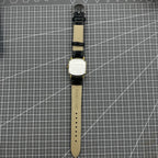 28mm Tianjin Seagull watch with octagonal gold case, golden dial, manual mechanical movement, elegant design.