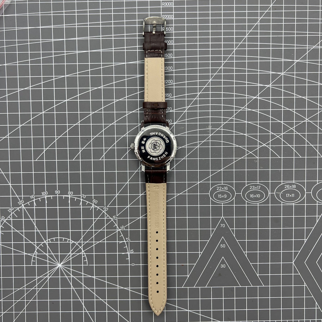 China Baihua 37mm manual mechanical watch with silver dial, 19 jewels, shock-resistant, classic style.