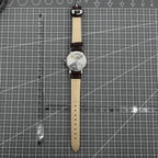 Shanghai 33mm manual mechanical watch with 17 jewels, single calendar, and shock-resistant design for precise timekeeping.