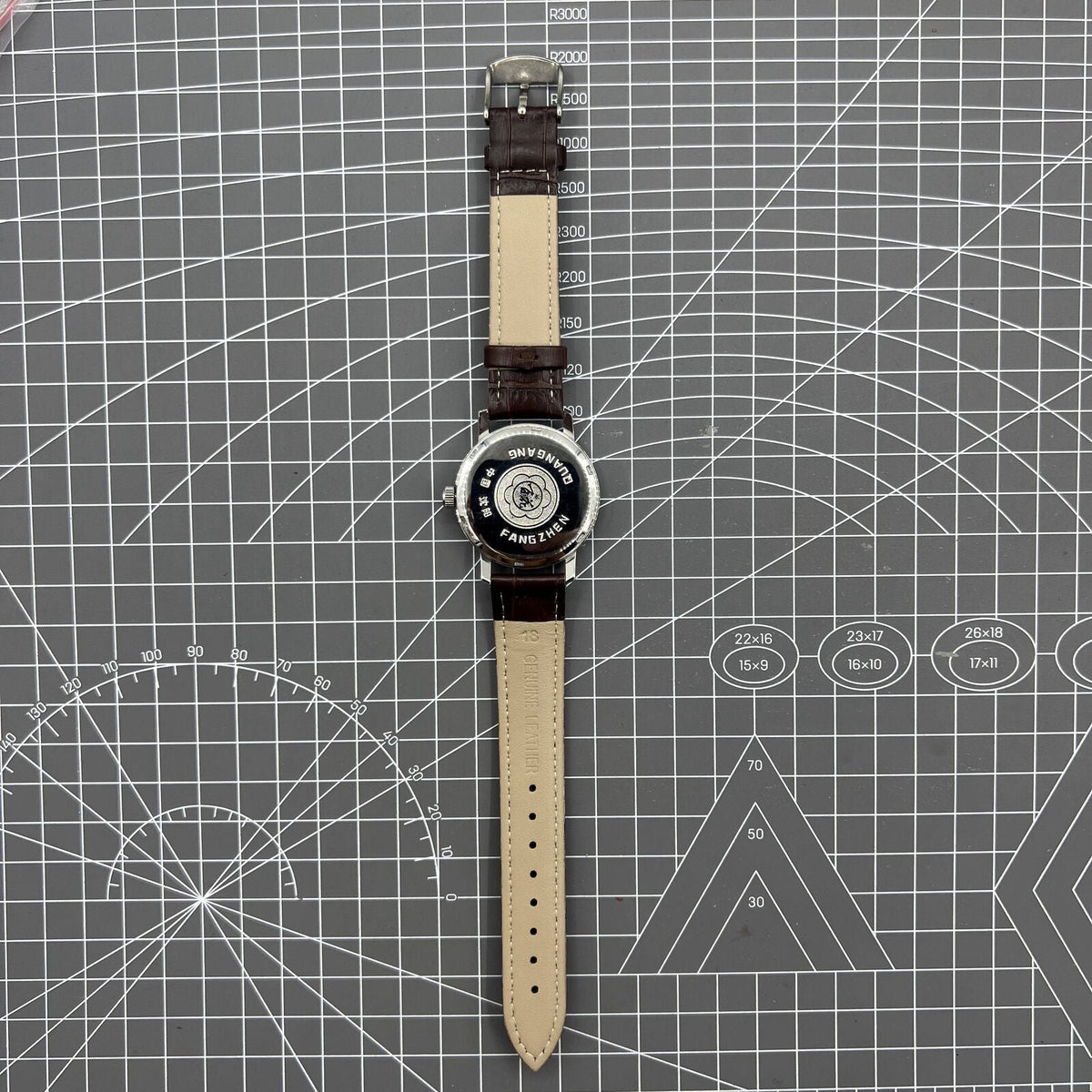China Baihua 37mm manual mechanical watch with silver dial, 19 jewels, and durable shock-resistant build.