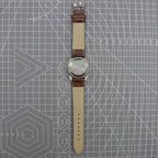 Dandong Peacock 37mm manual watch with golden dial, single calendar, 33 jewels, elegant style.