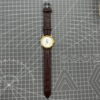 Beijing Double Rhomb mechanical watch with golden case and silver nail markers, elegant design