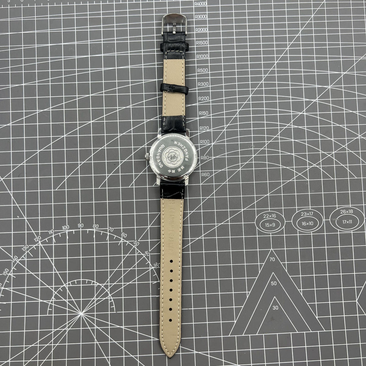 Baihua 37mm manual mechanical watch with silver dial, 19 jewels, and shock-resistant durability.