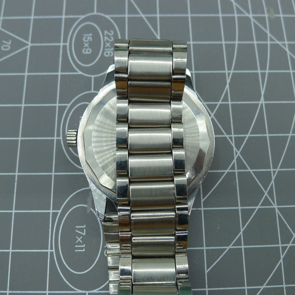 Shanghai Factory 36.5mm manual mechanical watch with 19 jewels, shock-resistant for long-lasting performance.