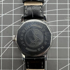 Taihang 32mm manual watch with black dial, gold nail markers, 17-jewel precision movement.