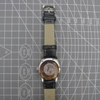 Silver 31mm Beijing Double Rhomb manual mechanical watch with three hands, sleek design by Beijing brand.