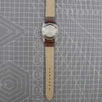 Dandong Peacock 37mm manual watch with golden dial, single calendar, 33 jewels, elegant style for formal wear.