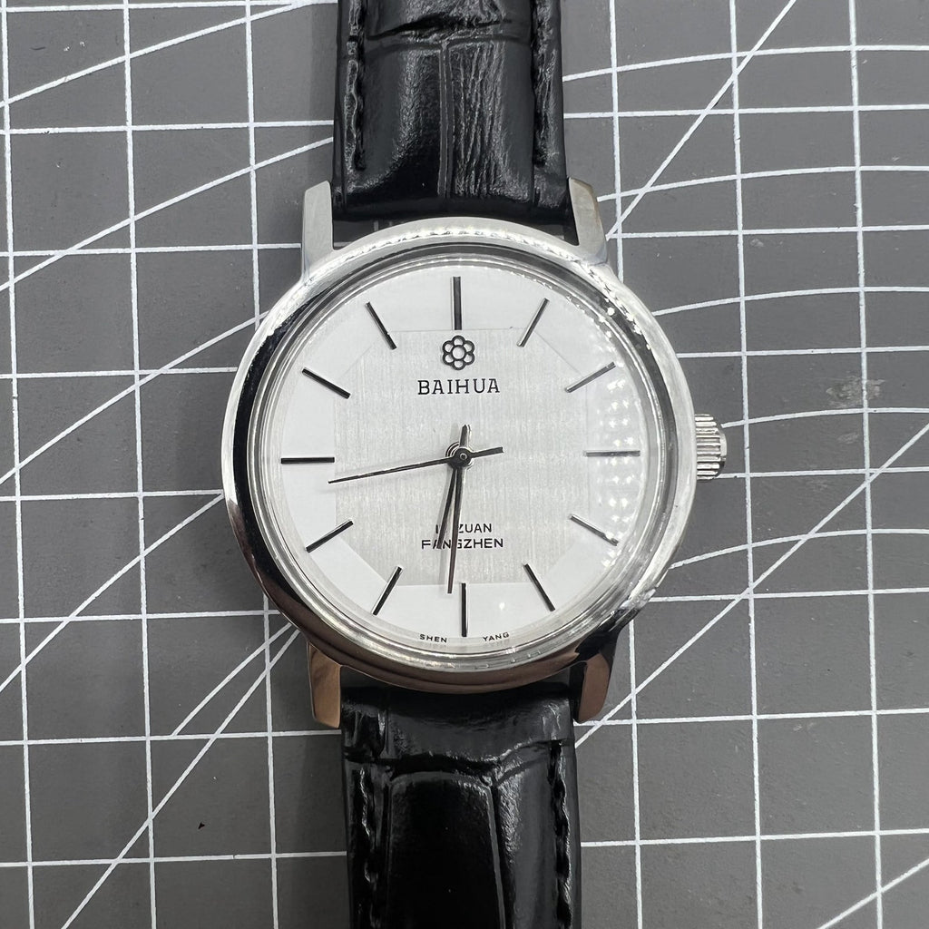 China Baihua 37mm manual mechanical watch with 19 jewels, silver dial, shock-resistant for lasting performance