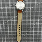 PUBU 32mm manual mechanical watch with grey dial and nail markers, showcasing 17 jewels and precise craftsmanship.