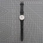 Beijing 31mm manual mechanical watch with silver case and double rhomb dial, classic Chinese craftsmanship.