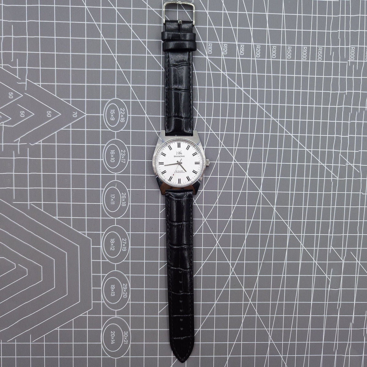 Shanghai Factory 38mm manual mechanical watch with white dial, 3 hands, 19 jewels, classic design.