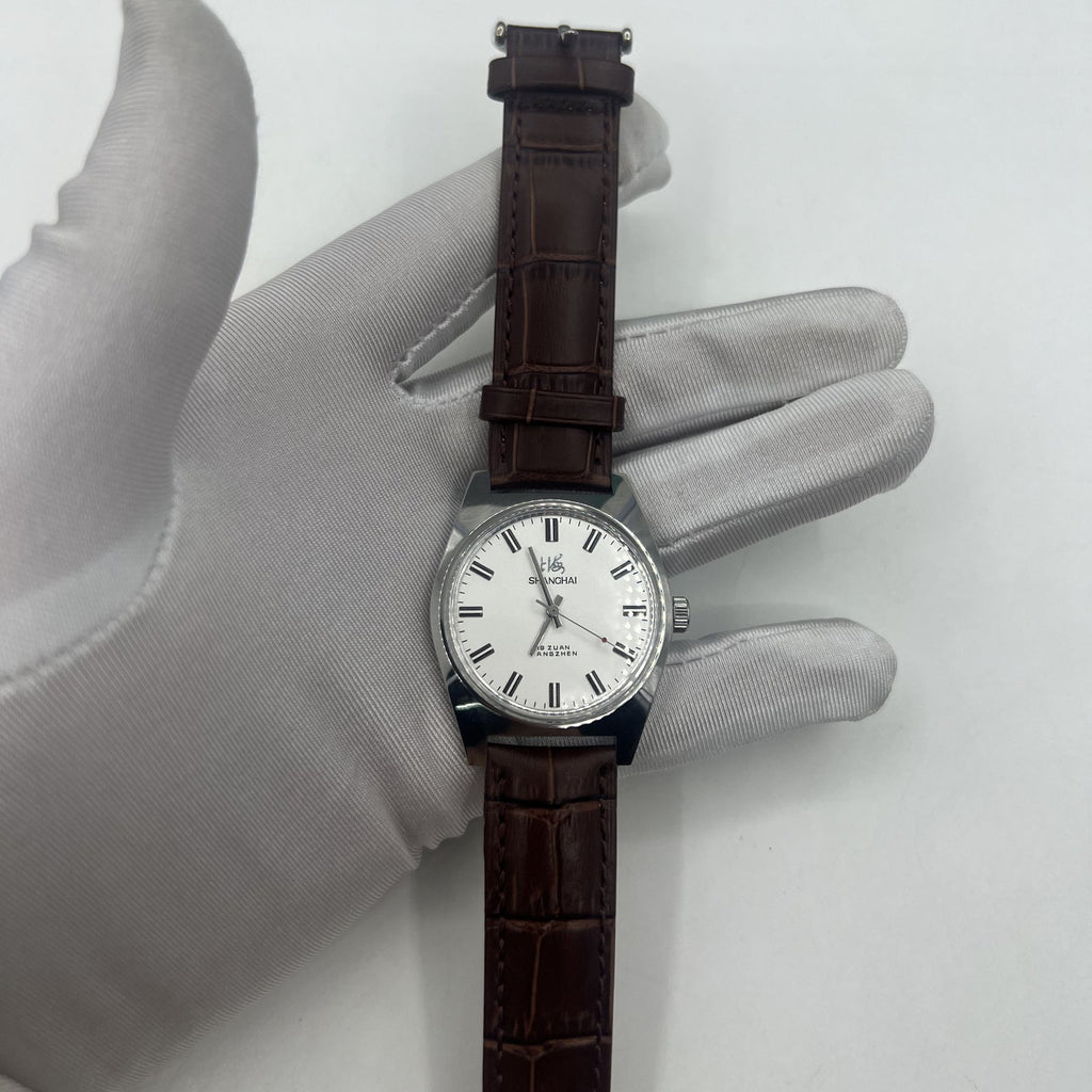 Shanghai Factory 38mm manual mechanical watch with white dial, 3 hands, 19 jewels for precise timekeeping and classic style.