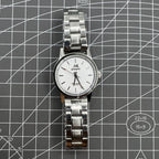 Silver 32mm Shanghai Factory manual mechanical watch with 19 jewels, shock-resistant, classic style.