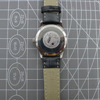 Beijing 31mm manual mechanical watch with silver case, double rhomb dial, showcasing classic Chinese craftsmanship.