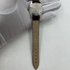 HONGLIAN 32mm manual mechanical watch with 17 jewels and Roman numerals, elegant Chinese craftsmanship.