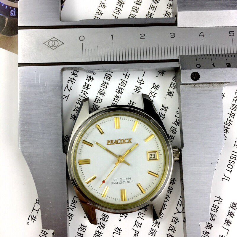 Liaoning Factory Made Peacock mechanical watch with 17 jewels, shock-resistant design for durability.