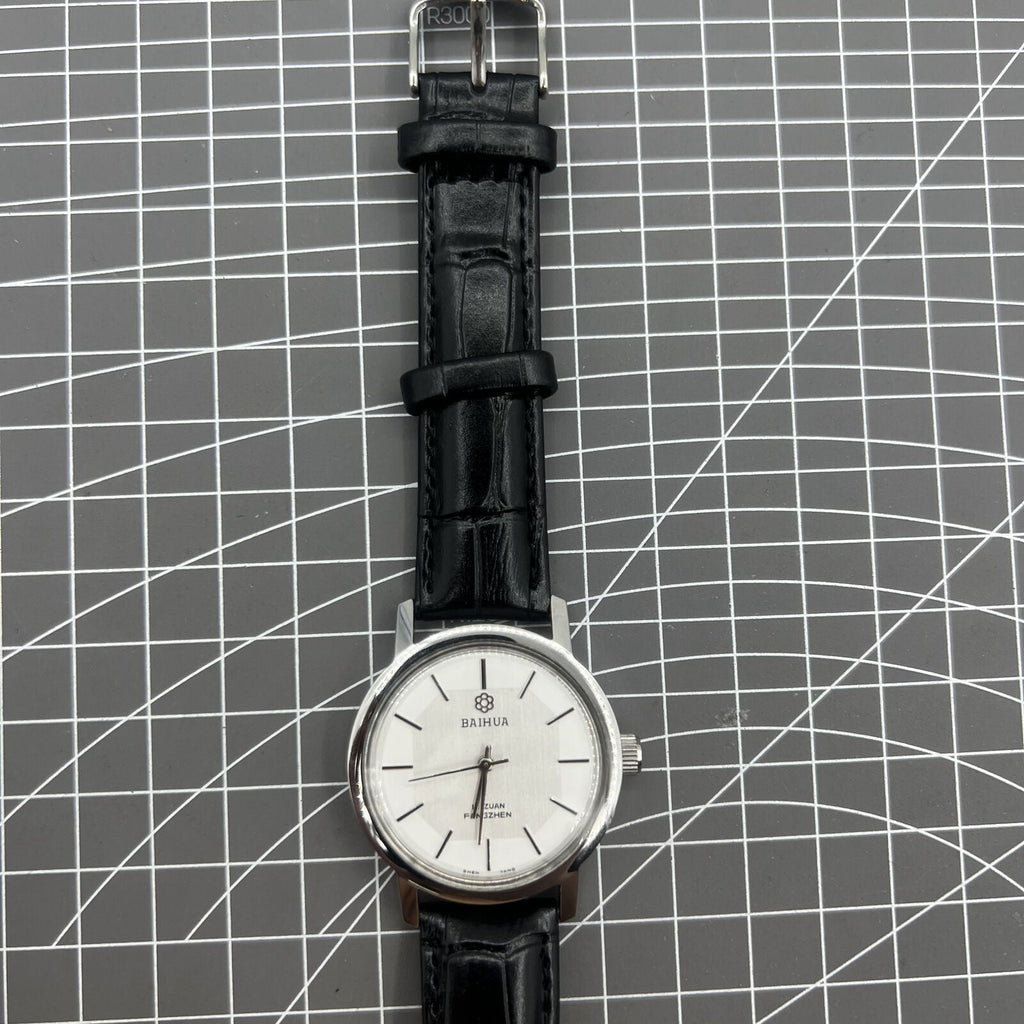 37mm Baihua manual mechanical watch with silver dial, 19 jewels, shock-resistant design for durability.