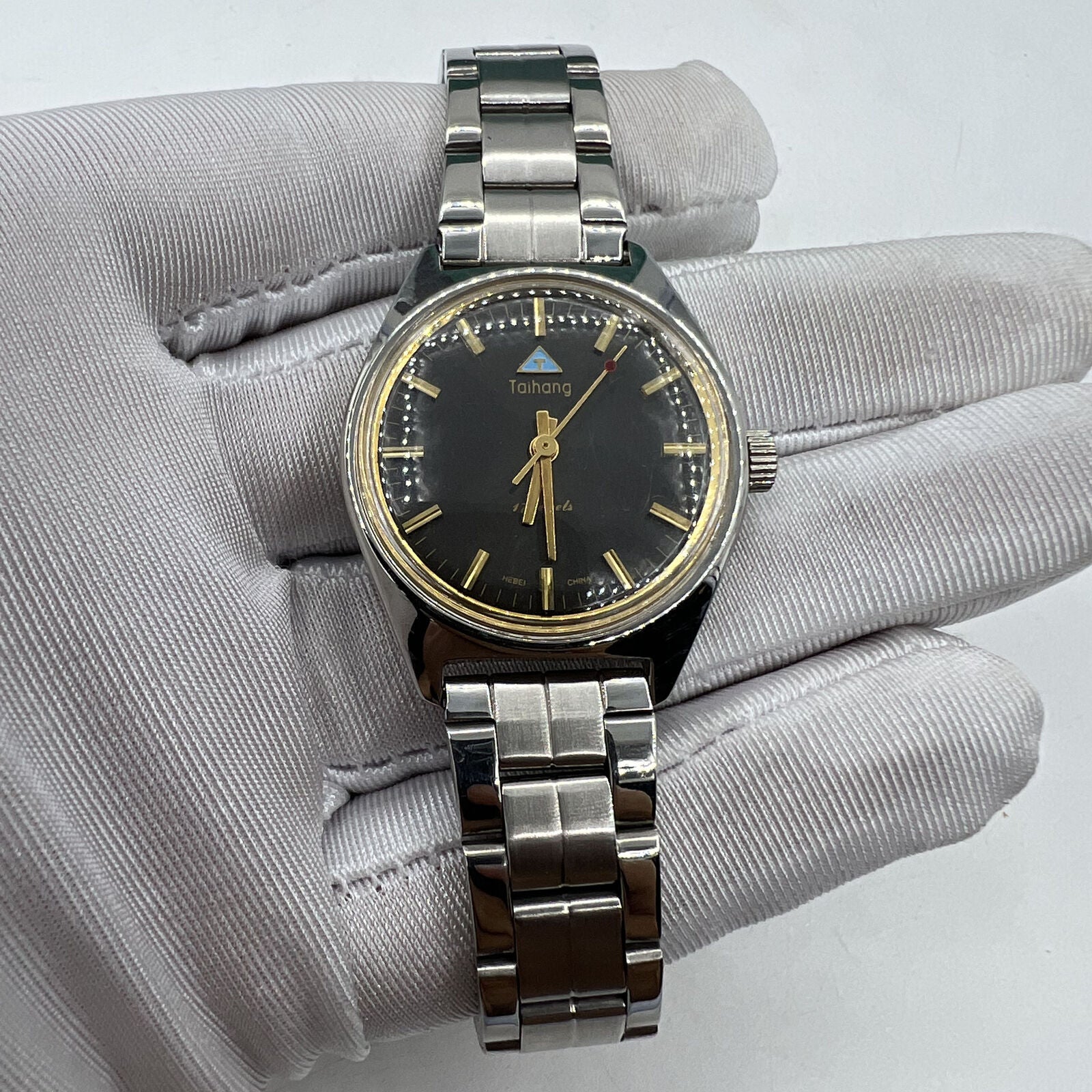 32mm Chinese Taihang manual watch, black dial with golden markers, 17 jewels precision movement.