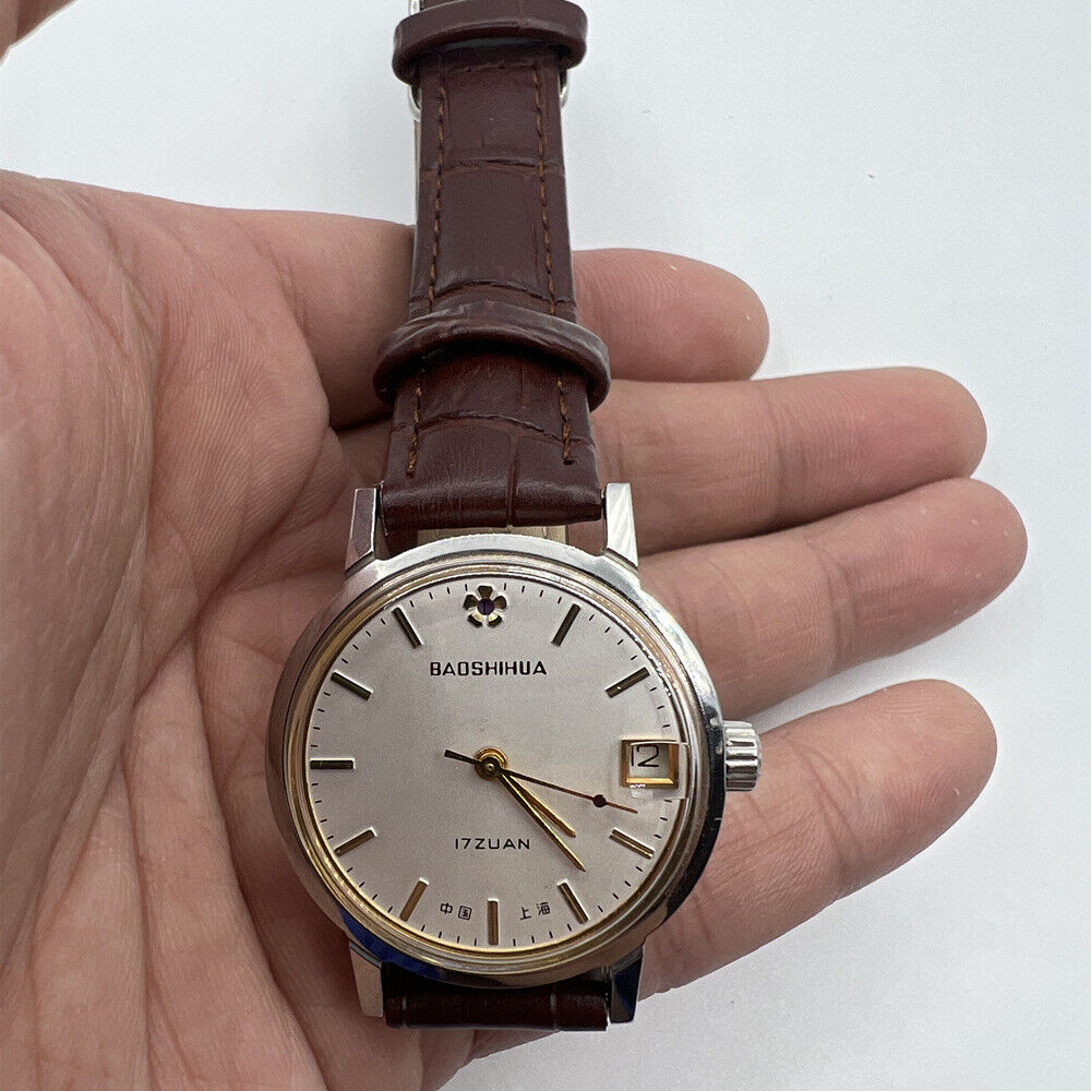 33mm Shanghai manual mechanical watch with single calendar, 17 jewels, shock-resistant design.