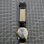 Black Dandong manual mechanical watch featuring 17 jewels, single calendar, and gold dial for timeless style.