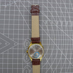 33mm Shanghai watch with blue dial, golden nail markers, square case, manual mechanical movement, 17 jewels by Shanghai.