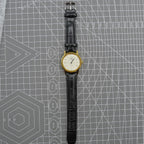Beijing Double Rhomb mechanical watch with golden case and silver hour markers, elegant design.