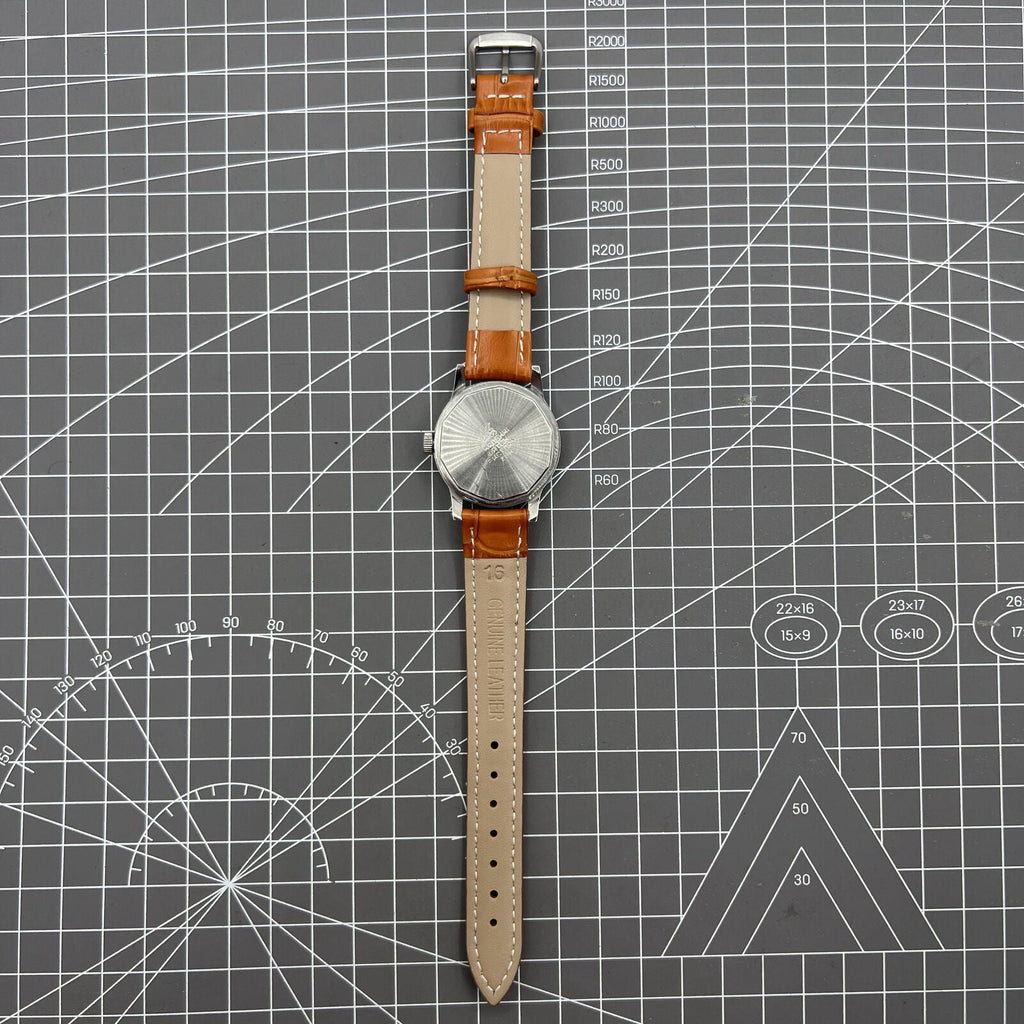 Shanghai Factory 32mm manual mechanical watch with 19 jewels, shock-resistant, classic timepiece for daily wear.