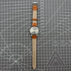 Shanghai Factory 32mm manual mechanical watch with 19 jewels, shock-resistant, classic timepiece for daily wear.