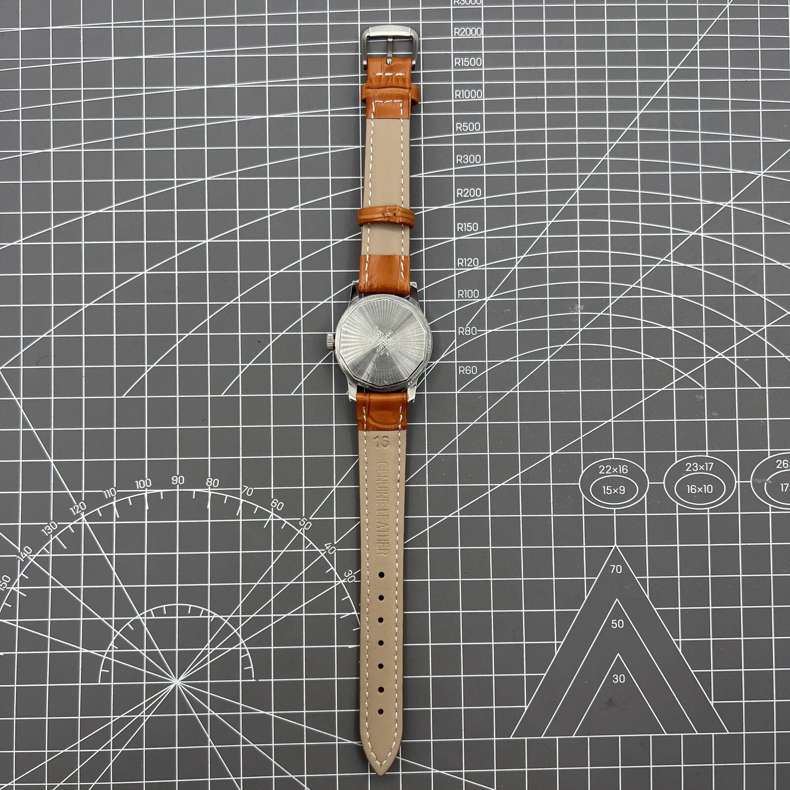 Shanghai Factory 32mm manual mechanical watch with 19 jewels, shock-resistant, classic timepiece for daily wear.