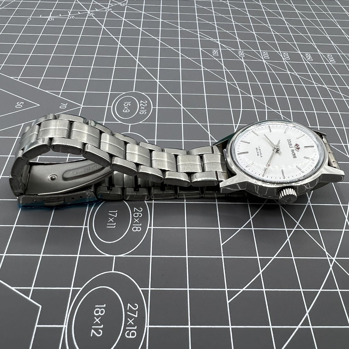 Beijing 31mm manual mechanical watch with silver case, three hands, and classic Chinese craftsmanship for precise timekeeping.