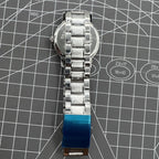 China Baihua 37mm manual mechanical watch with silver dial, 19 jewels, and shock-resistant casing.