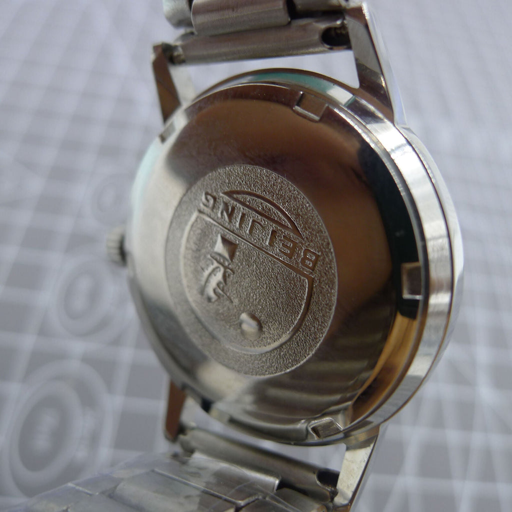Beijing 36mm manual mechanical watch with silver case, nail-shaped markers, classic design by Beijing brand.