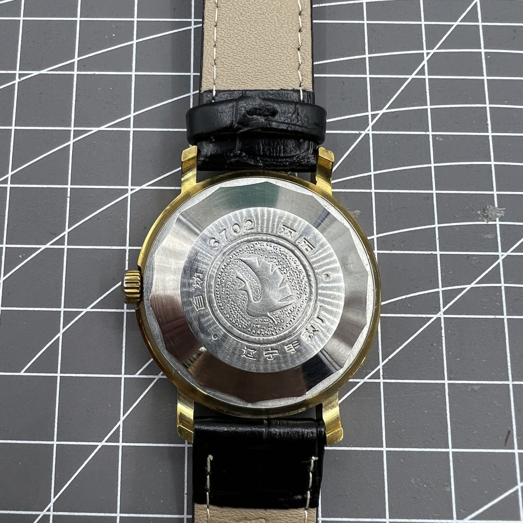 Kongque 37mm automatic watch with black dial, double calendar, 33 jewels, and elegant design.