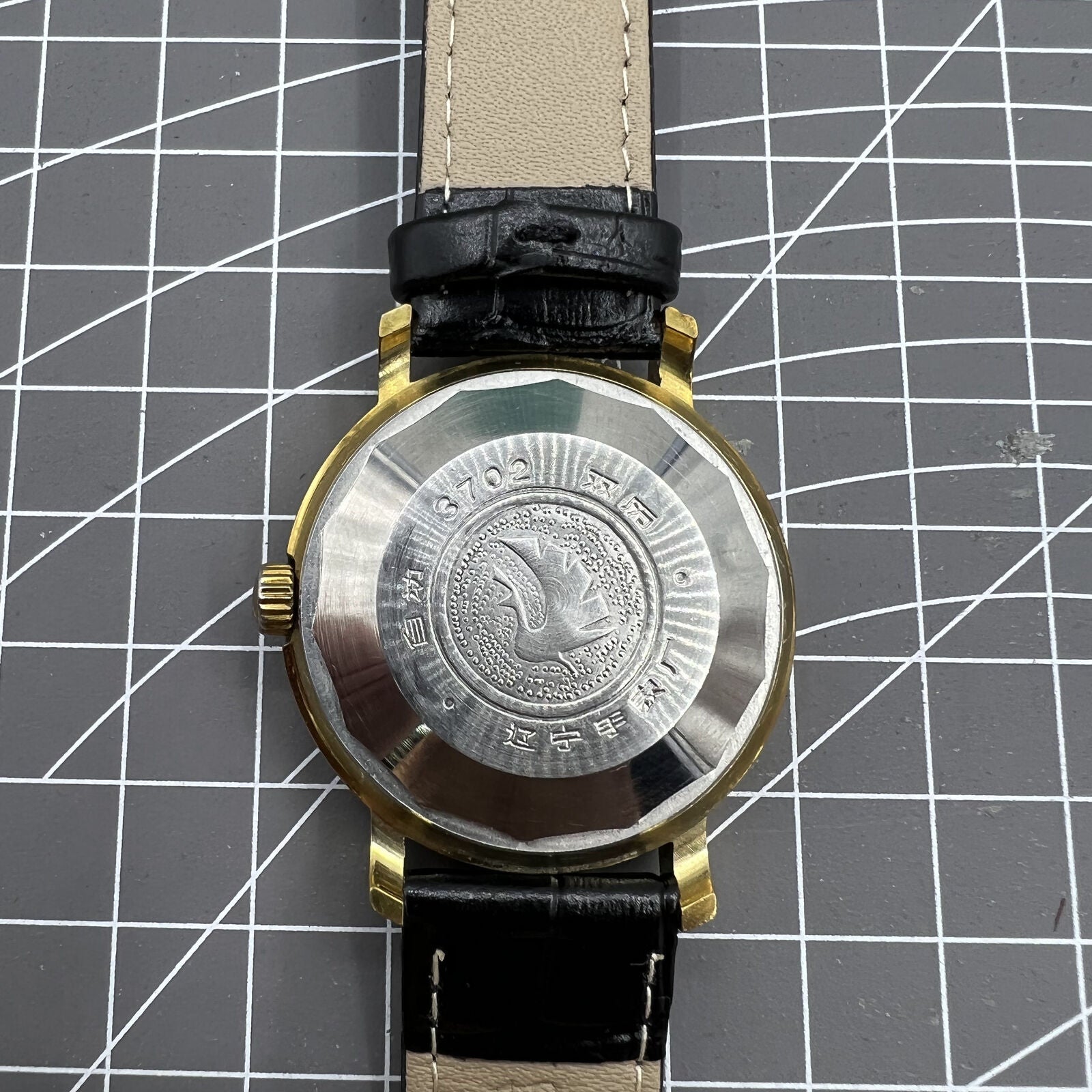 Kongque 37mm automatic watch with black dial, double calendar, 33 jewels, and elegant design.
