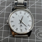 Shanghai Diamond 38mm manual mechanical watch with 17 jewels, white dial, silver case, elegant design.