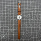 Shanghai Factory 32mm manual mechanical watch with 19 jewels, shock-resistant, classic timepiece design.