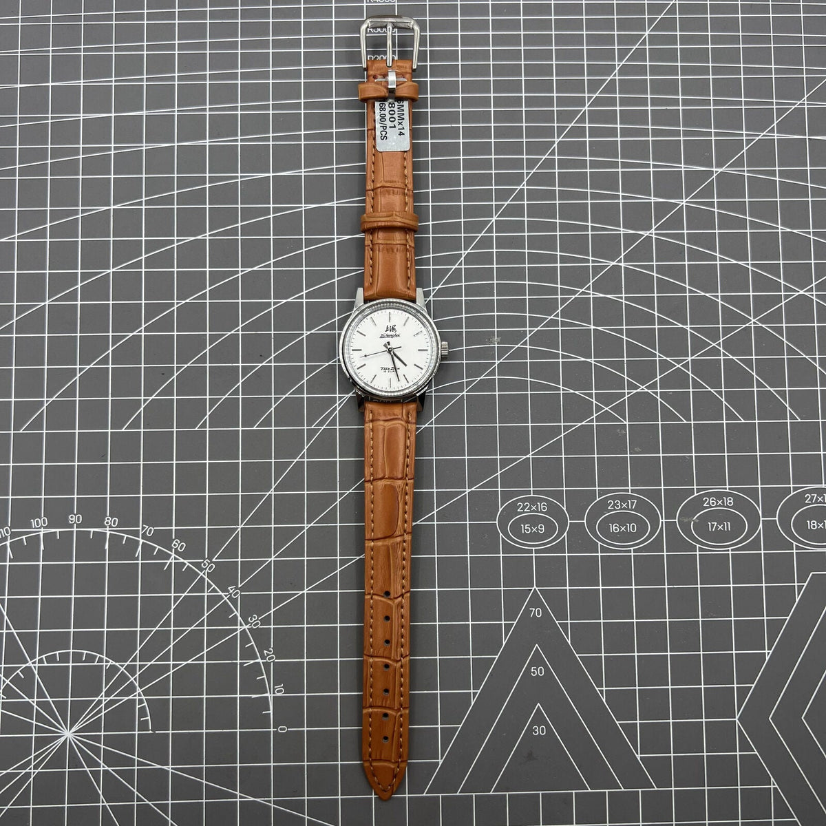 Shanghai Factory 32mm manual mechanical watch with 19 jewels, shock-resistant, classic timepiece design.