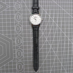 Beijing 31mm manual mechanical watch with silver case and double rhomb dial, showcasing classic Chinese craftsmanship.