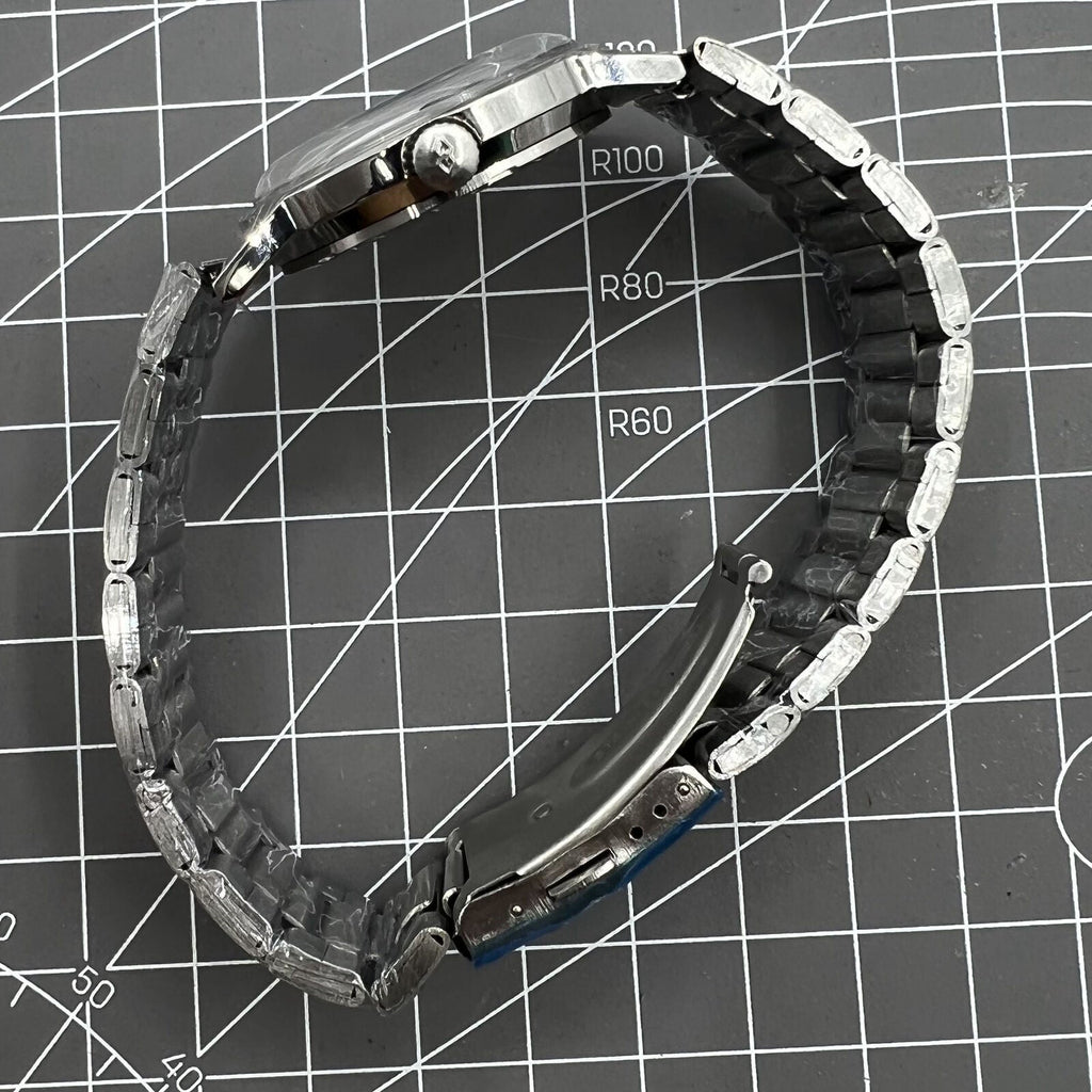 Silver 36mm Beijing Double Rhomb manual watch with silver case, nail markers, classic style for elegant timekeeping.