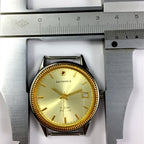 Shanghai 37mm manual watch with golden dial, nail markers, round case, 17 jewel mechanical movement by Shanghai.